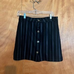 Black button and stripe mini skirt